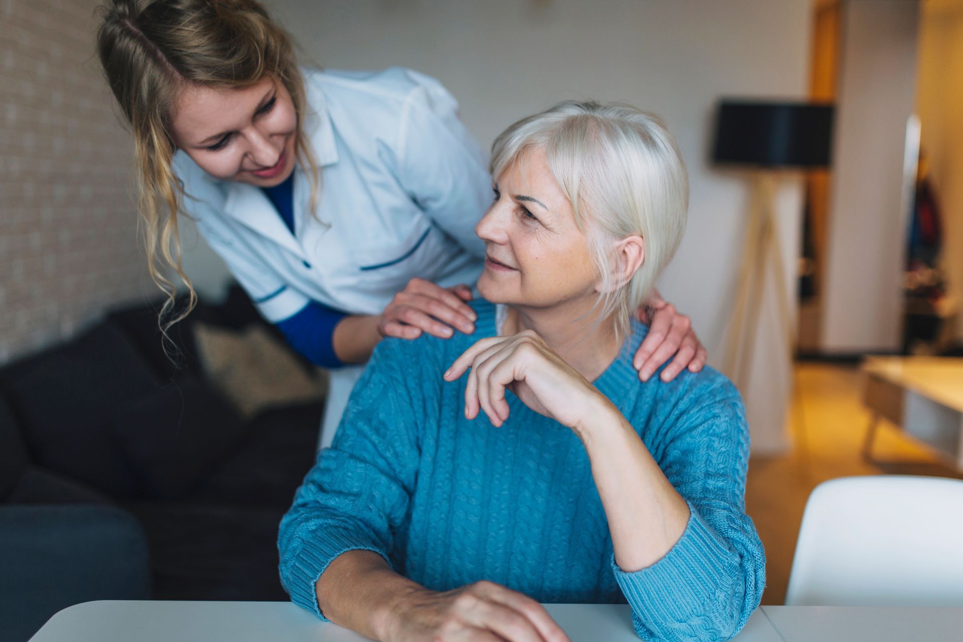 Nurse caring for an elderly patient