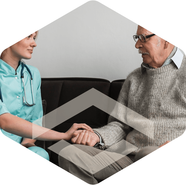 Therapist working with a patient in a wheelchair