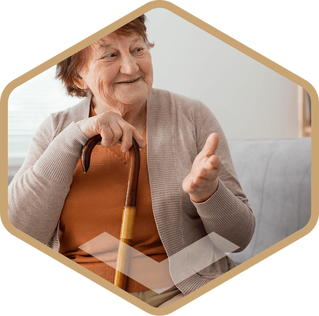 Caregiver with an elderly resident smiling